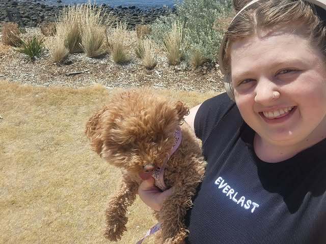 Paige with Luna at the beach